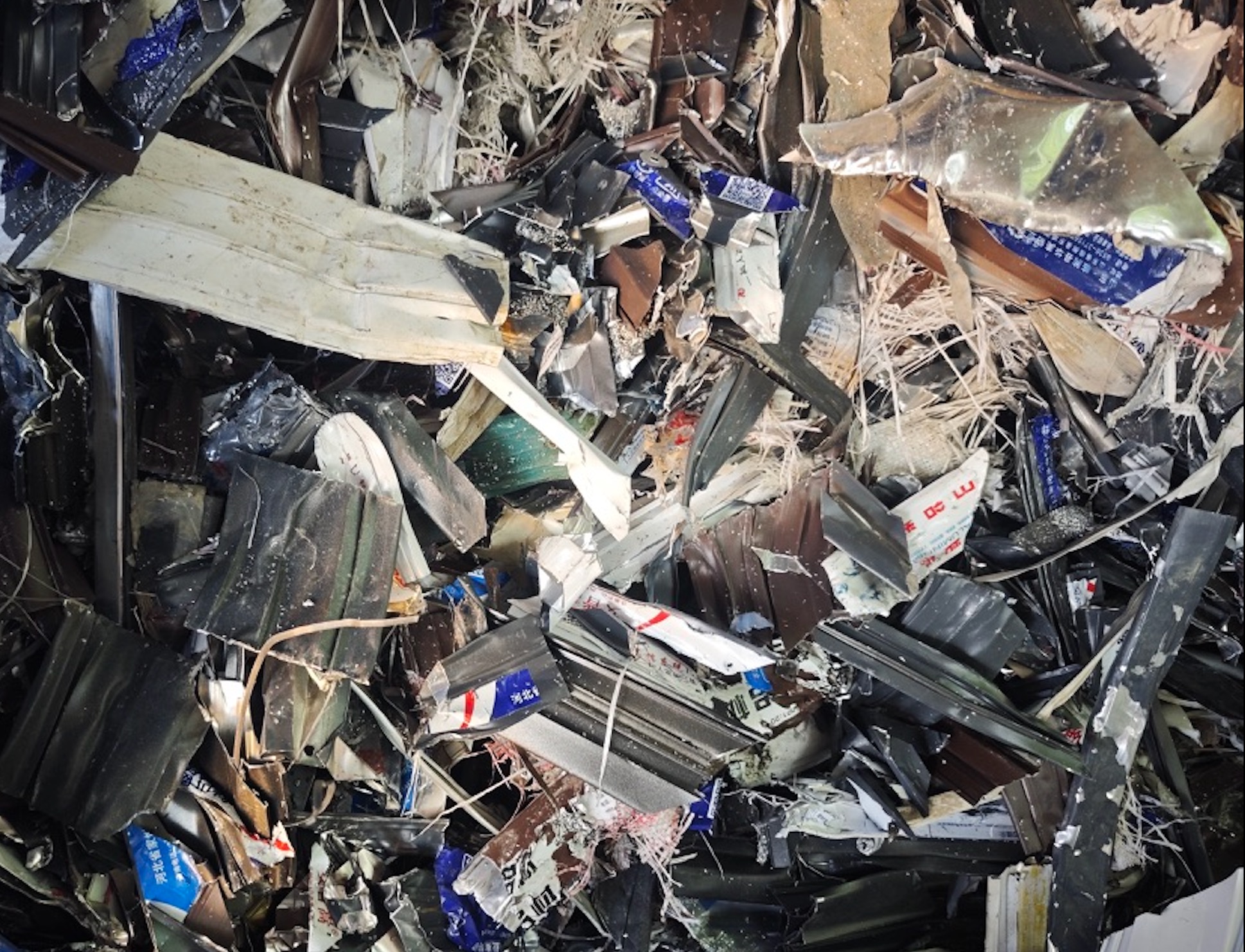 Double shaft shredder output material size.png